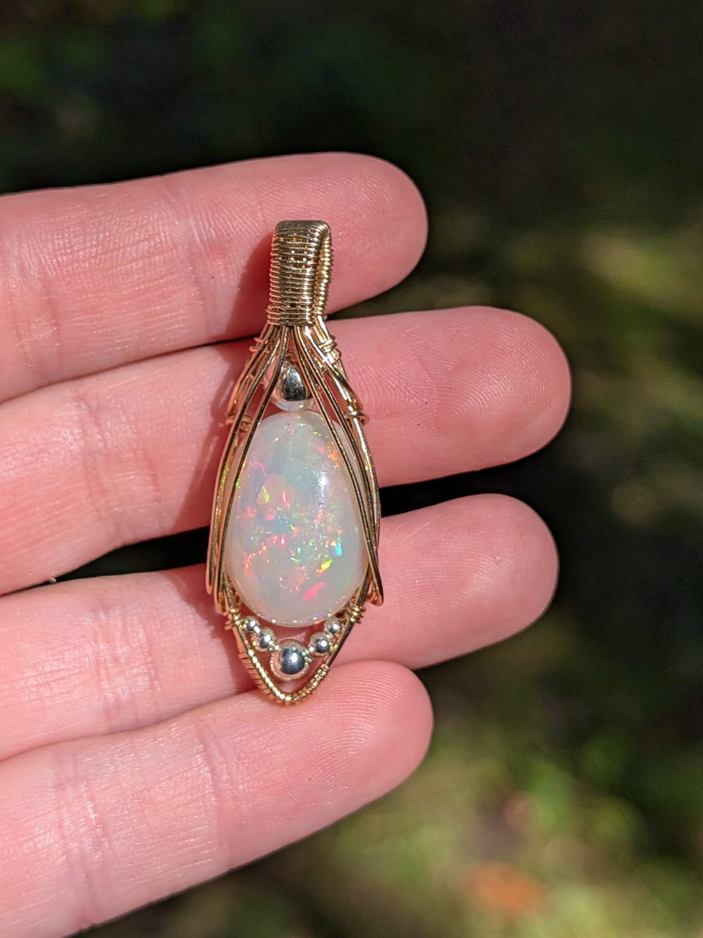 Handcrafted Opal Pendant in Gold